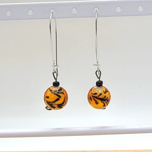 Blown glass earrings, orange and black, silvertone. - Picture 1 of 4